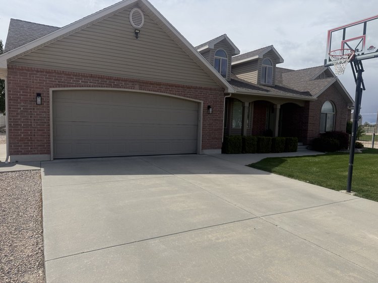 Garage door before replacement in Hooper