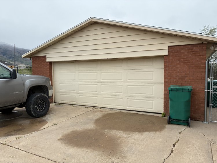 Garage door after Beehive State Doors off-track repair in Layton.