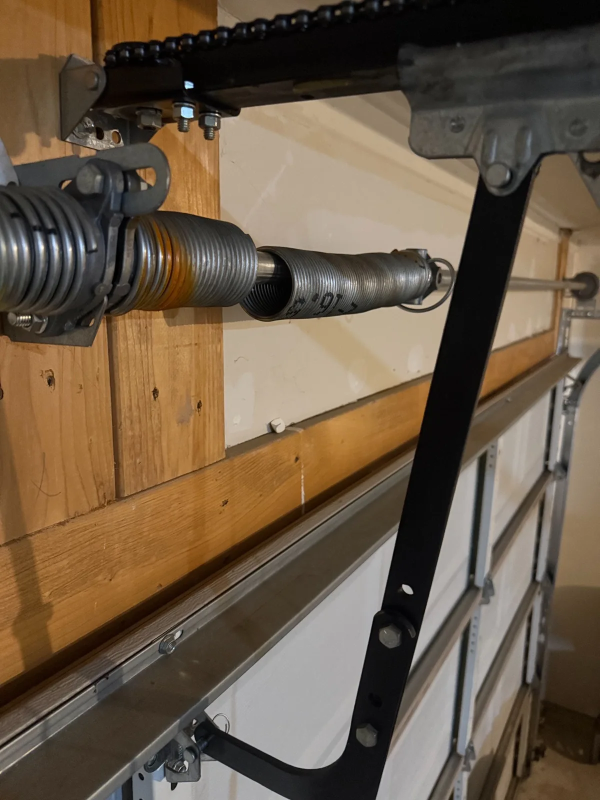 Broken garage door torsion spring